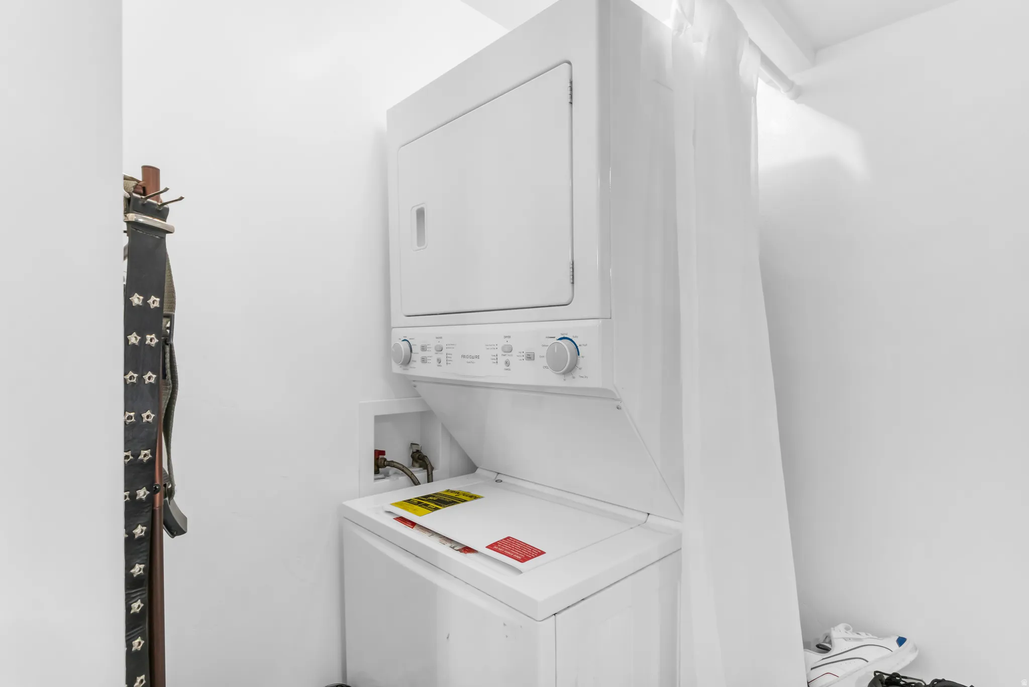 Stackable washer and dryer unit