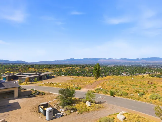 Mountain range backdrop and residential area in the distance