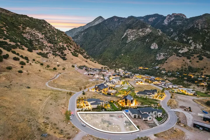 Mountainous landscape with residential development, paved roads, and built properties