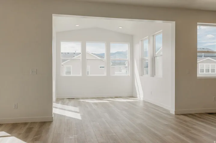 Vaulted ceilings in the sunroom create an expansive atmosphere
