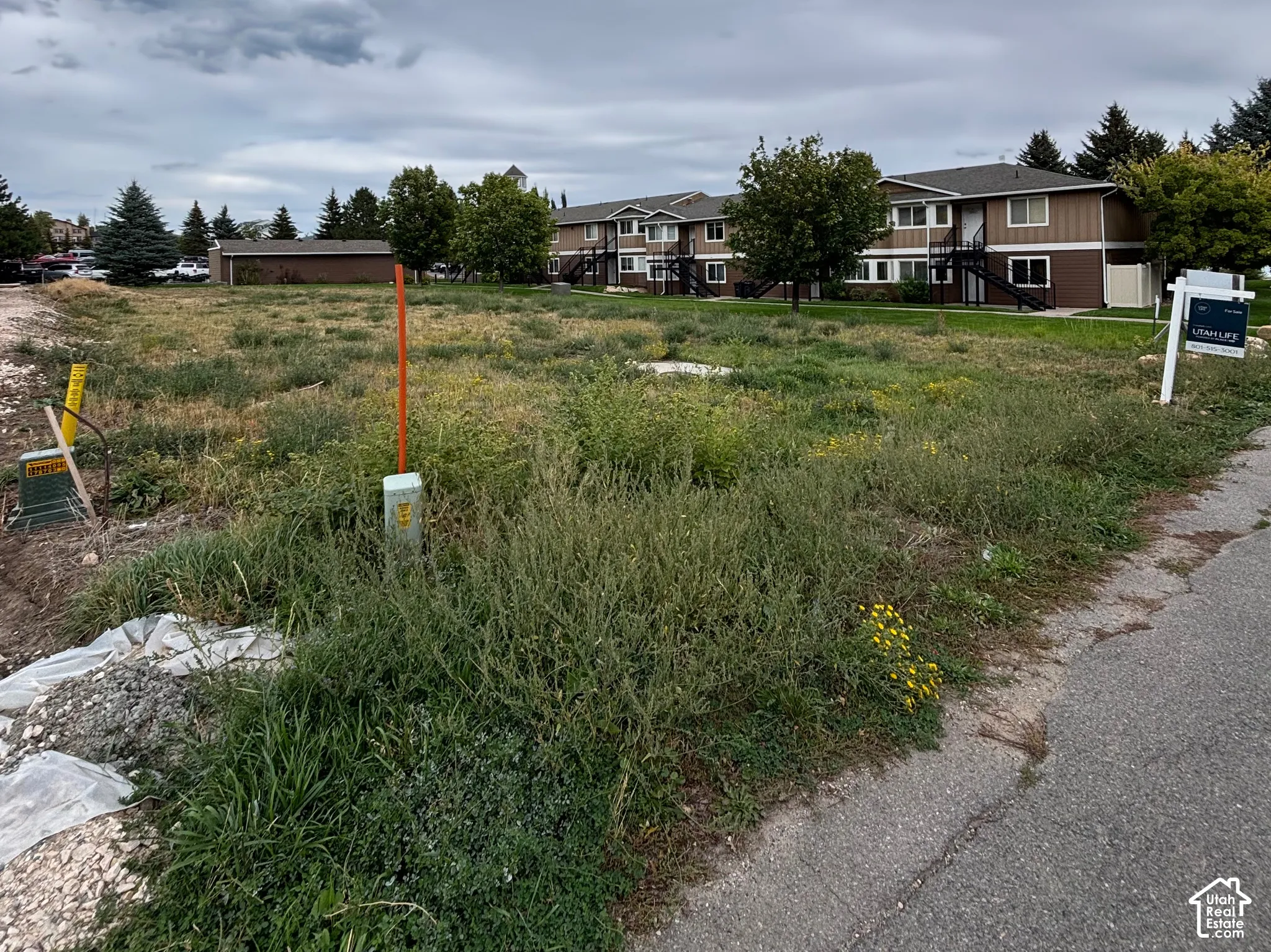 Expansive undeveloped lot with existing utilities