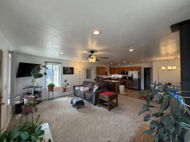 Recessed lighting, ceiling fan, wood-finish flooring, wood cabinetry, stainless steel appliances
