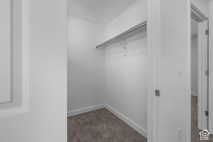 Built-in closet shelving with a hanging rod