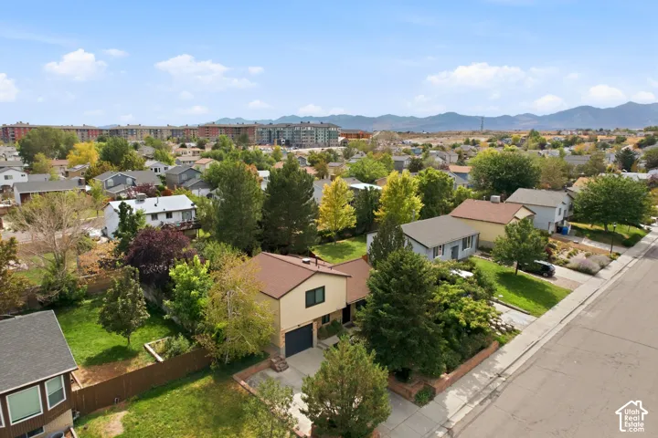 Mature trees and established landscaping surround the property