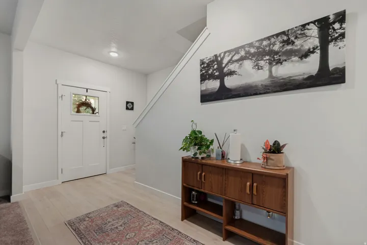 White entry door with transom window