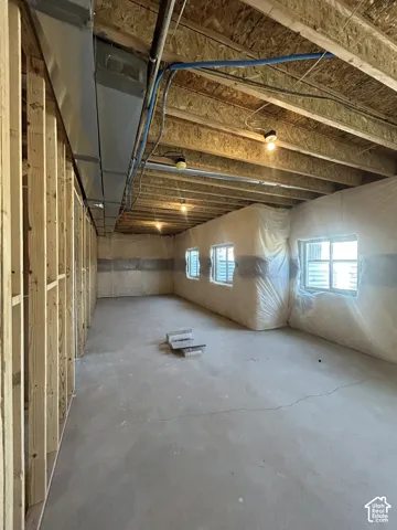 Concrete flooring with exposed ceiling joists