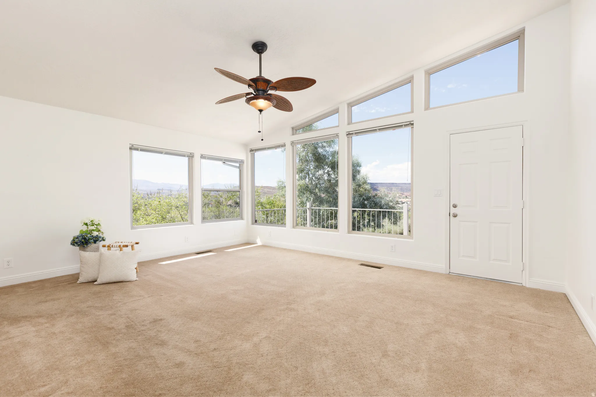 Primary bedroom with views and vaulted ceiling