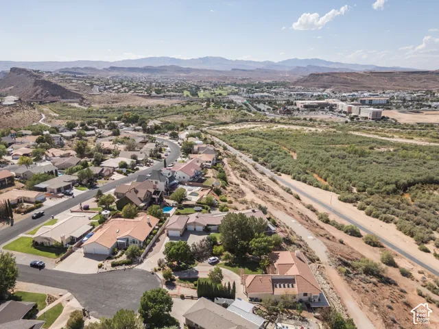 Residential area featuring varied architectural styles and mature landscaping