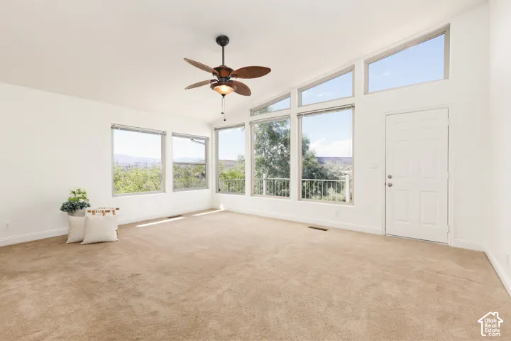 Primary bedroom with views and vaulted ceiling