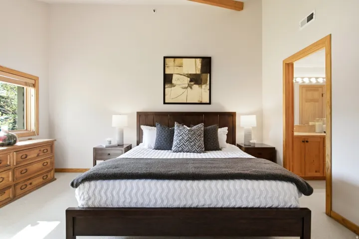 Vaulted ceiling with exposed wood beam