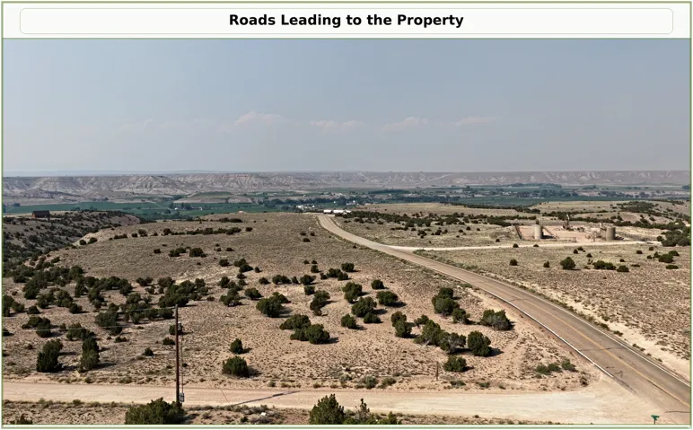 Expansive arid landscape with a paved road