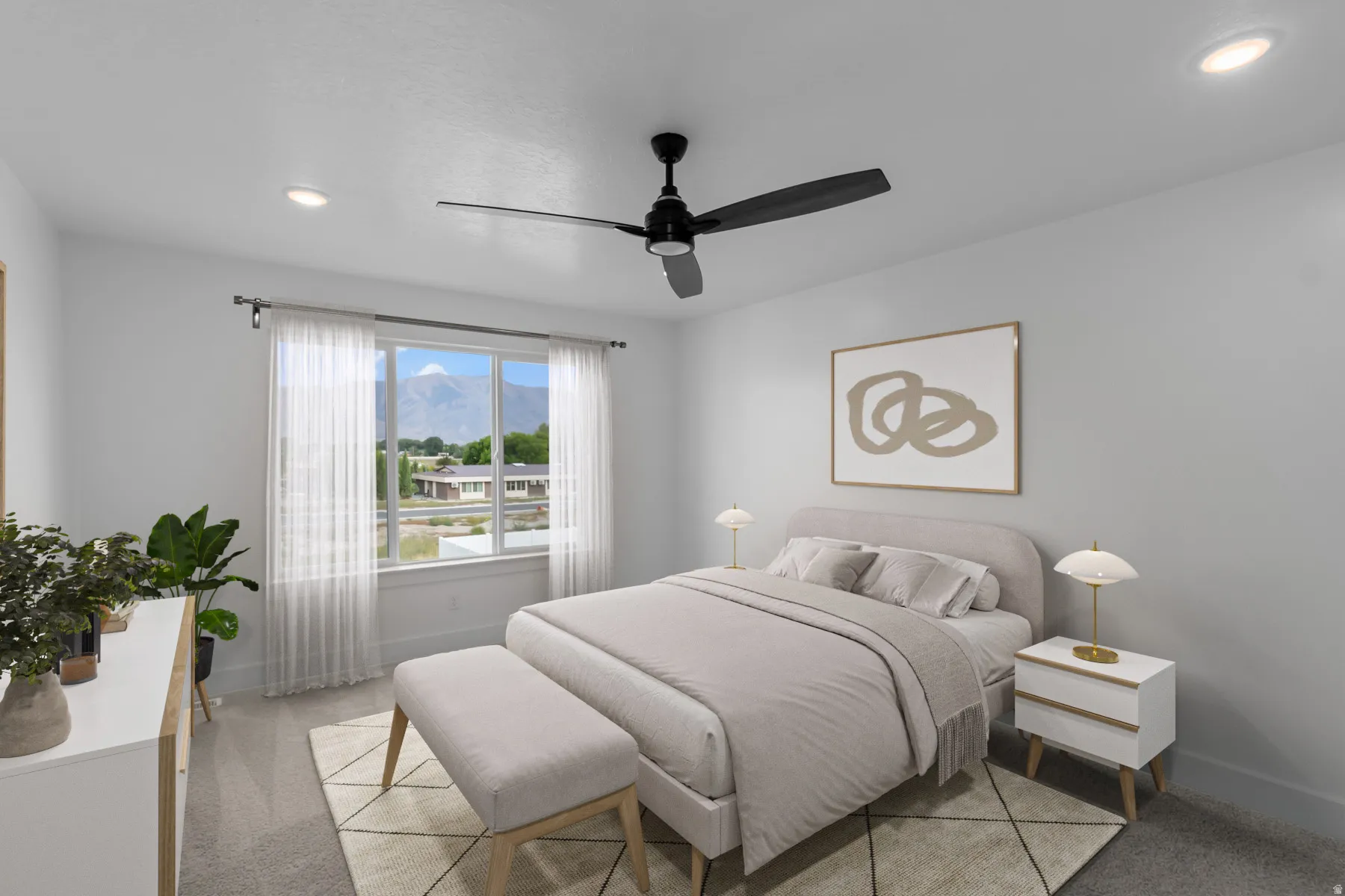 Recessed lighting, ceiling fan, and a large window with mountain scenery