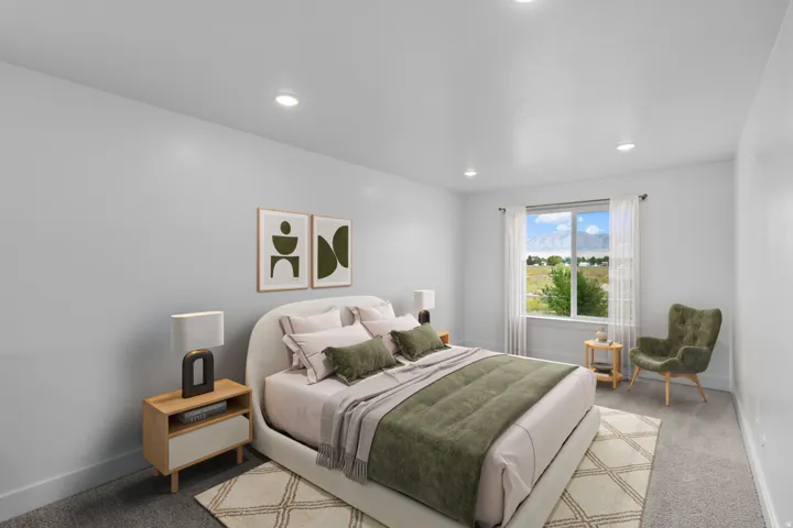 Recessed lighting, large window, mountain scenery, light gray walls, and carpet flooring