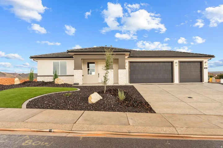 Contemporary exterior with stucco and stone accents