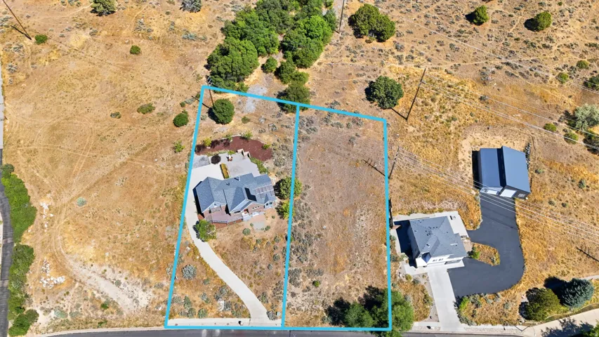 Expansive undeveloped lot with natural terrain