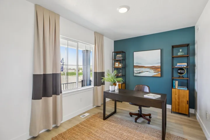 Recessed lighting, wood-finish flooring, accent wall, built-in shelving, large window