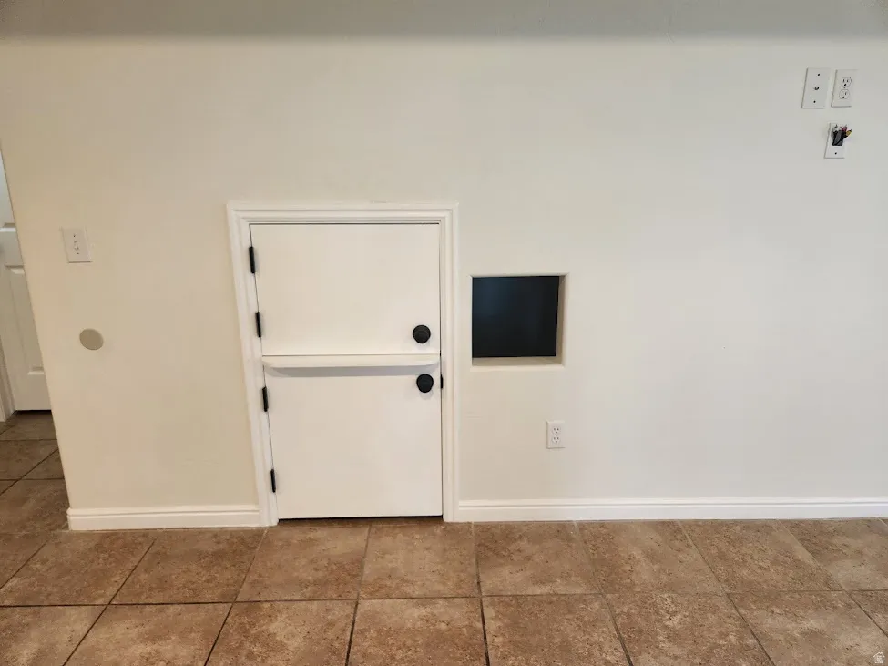 Tiled flooring throughout