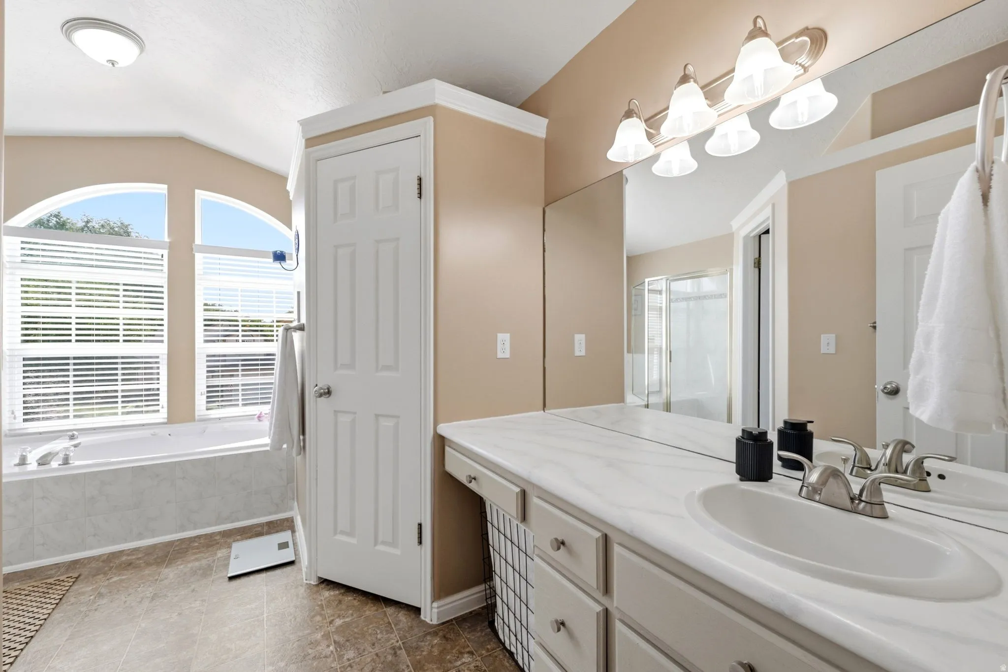 Arched windows provide abundant natural light