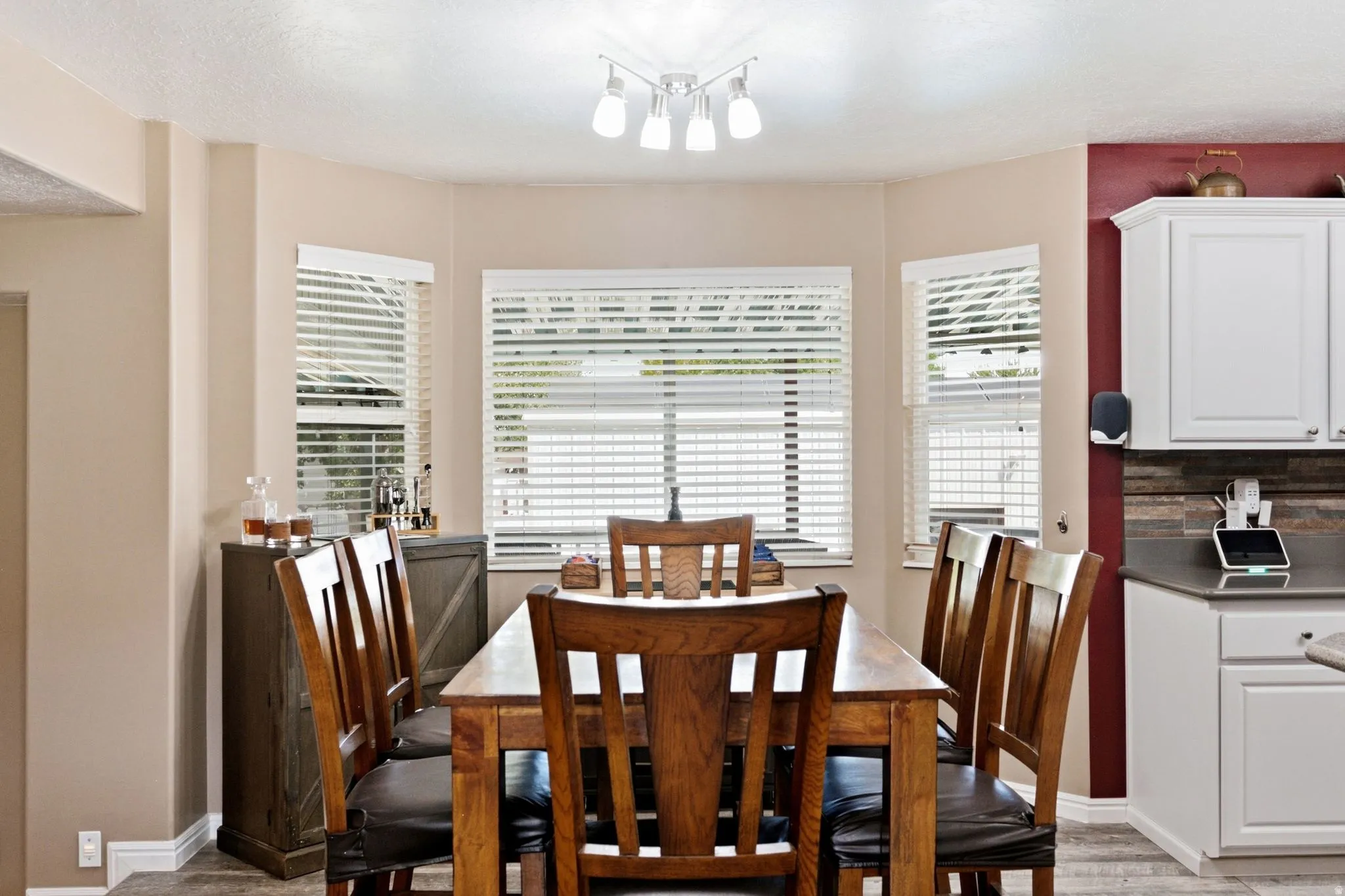 Bay window with multiple window treatments