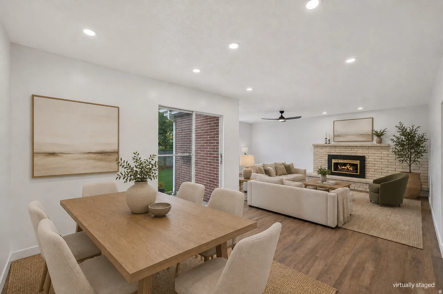 Open concept dinning and living room - virtually staged