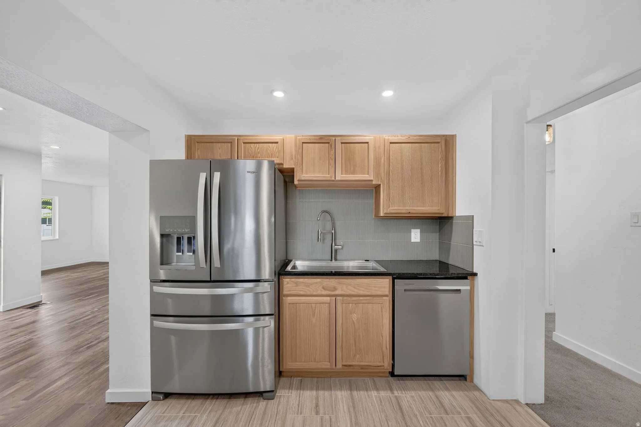 Stainless steel fridge, dishwasher, and large sink