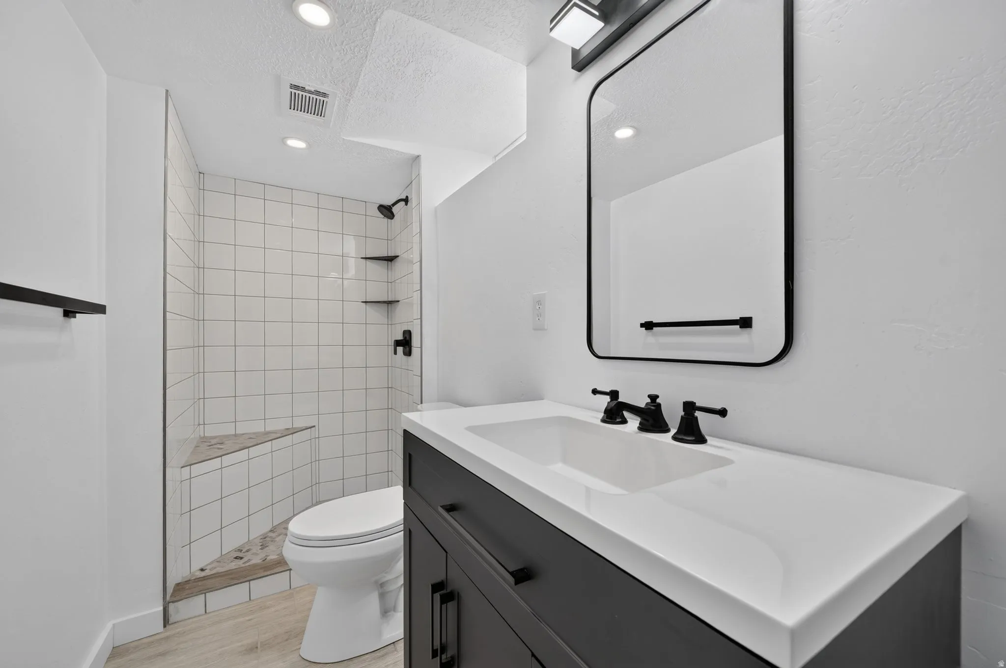 Secondary bathroom - fully updated walk in shower and vanity