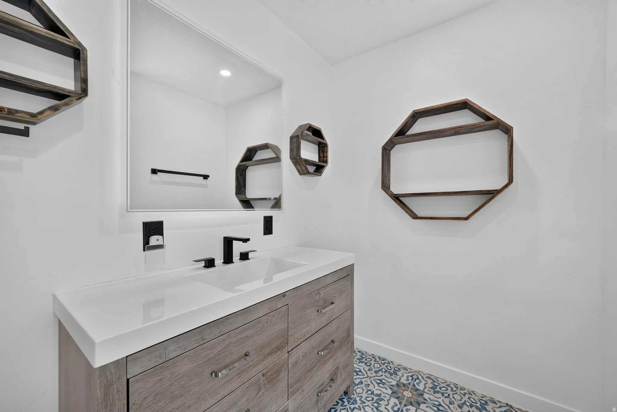 Spacious vanity in main bathroom.