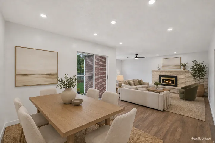 Open concept dinning and living room - virtually staged