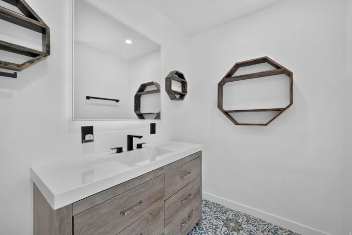 Spacious vanity in main bathroom.