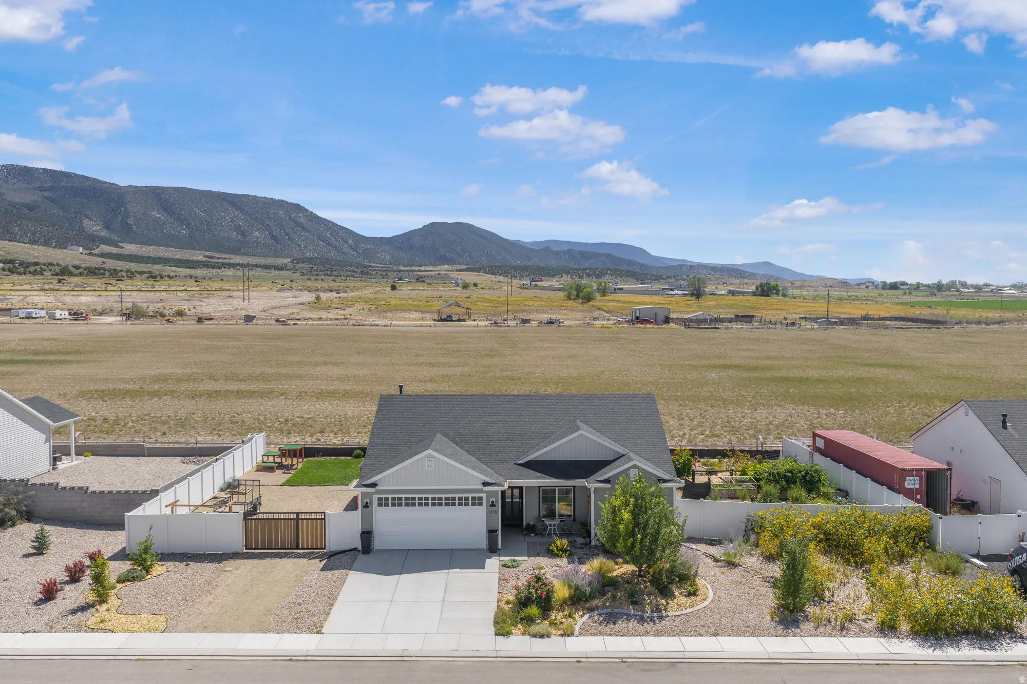 Aerial – Home & Mountain Views