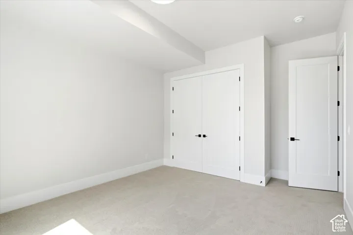 Neutral wall finishes with crisp white trim