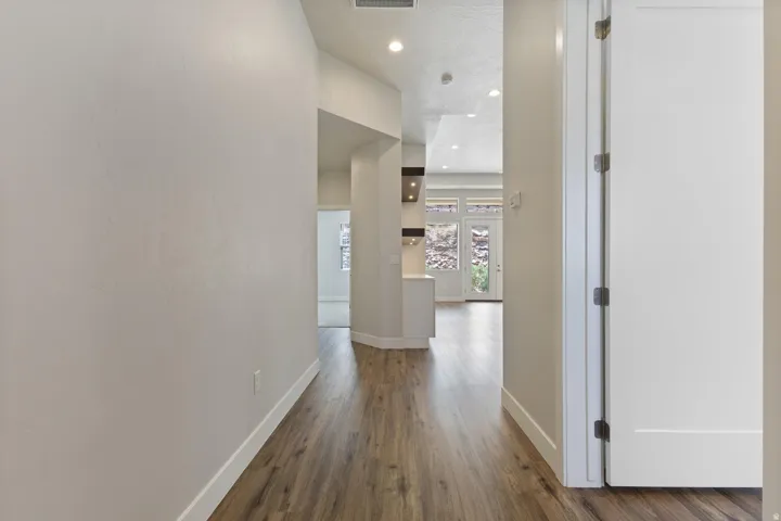 Wood-finish flooring with white trim