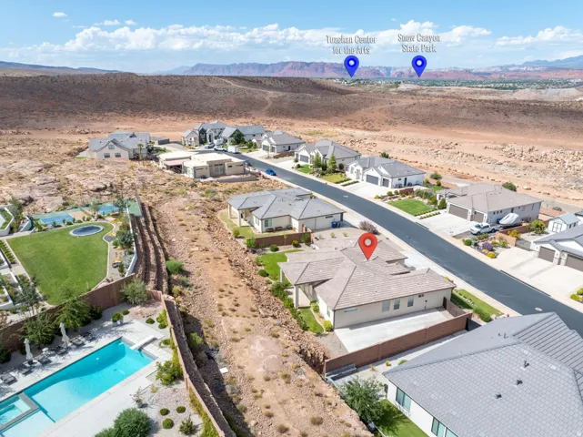 Neighborhood street with contemporary homes and desert landscaping