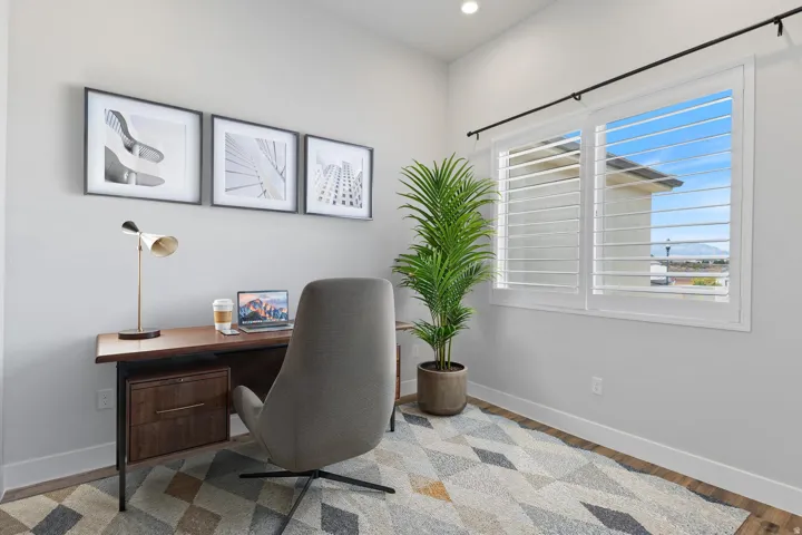 White window shutters, a ceiling-mounted light fixture, and light-colored walls