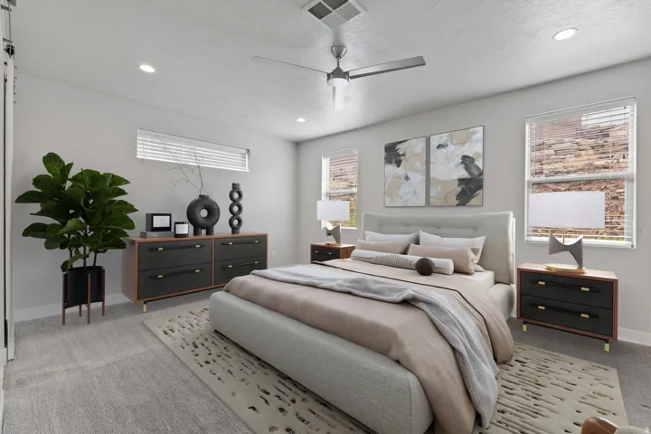 Recessed lighting, ceiling fan, and multiple windows with blinds