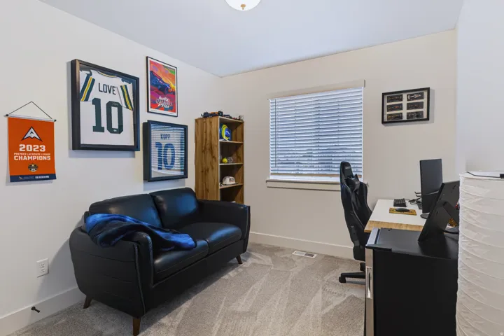 Carpeted flooring, recessed window, and light-colored walls