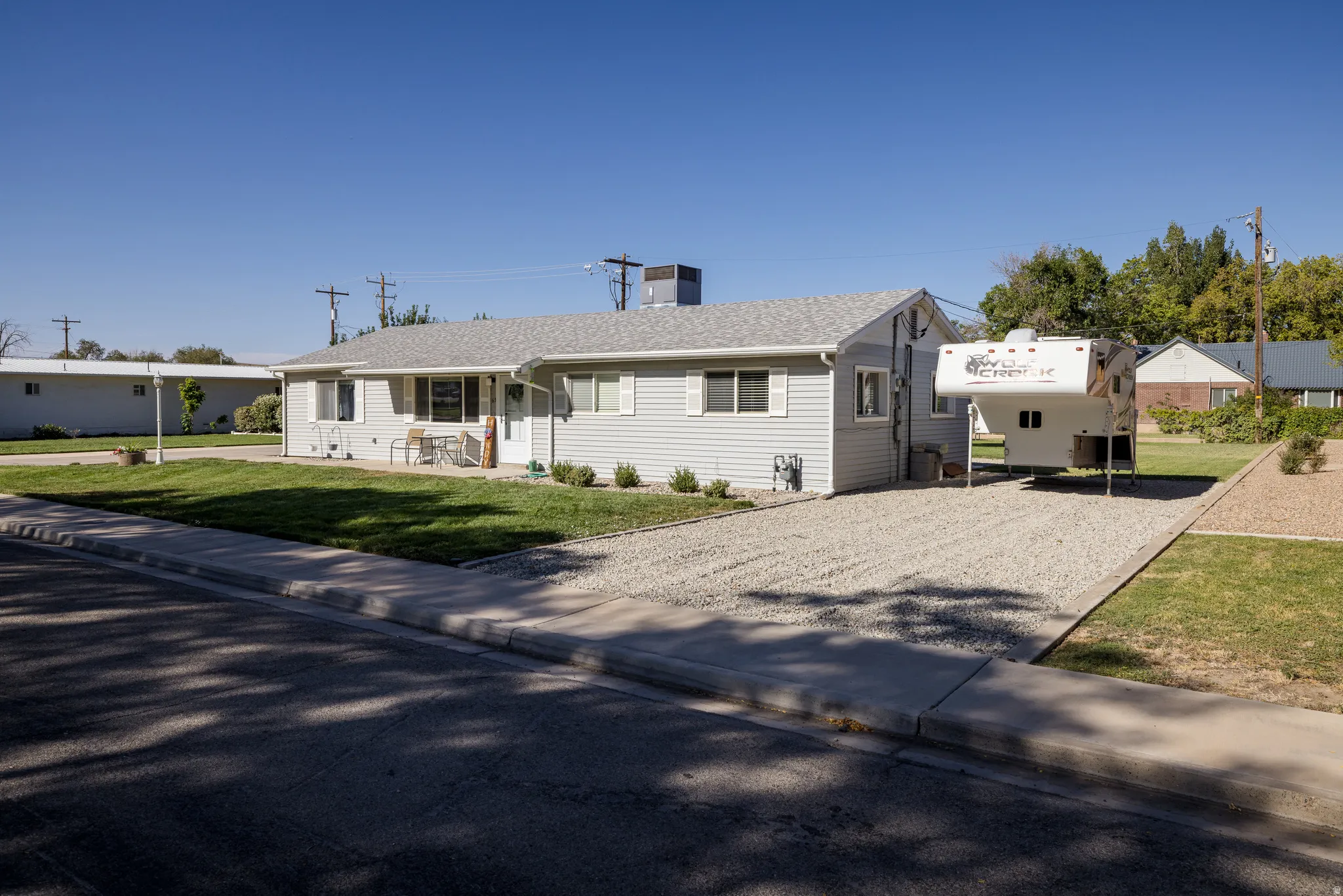 Light gray siding exterior with white trim