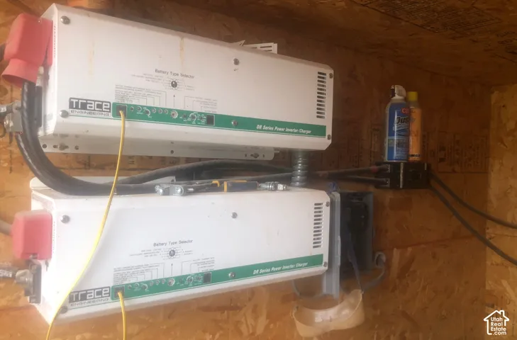 Dual Trace Engineering DR Series power inverter chargers mounted to oriented strand board wall paneling