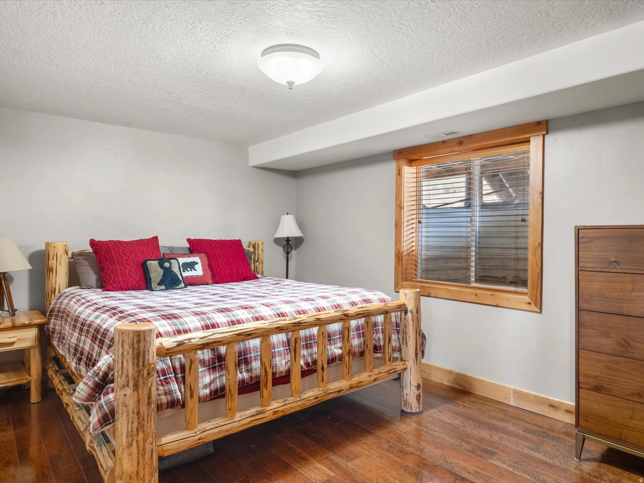 Wood-finish flooring with natural wood trim