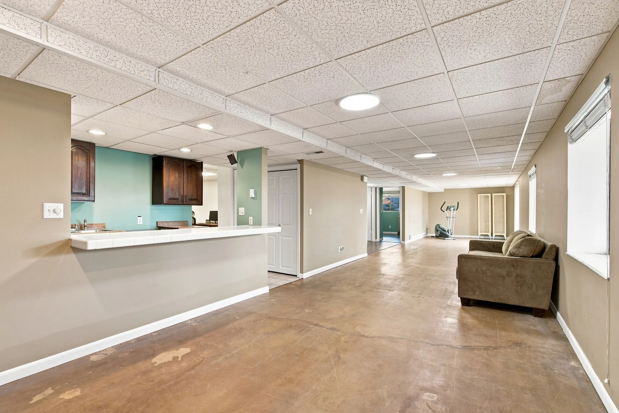 Basement living room with wet bar