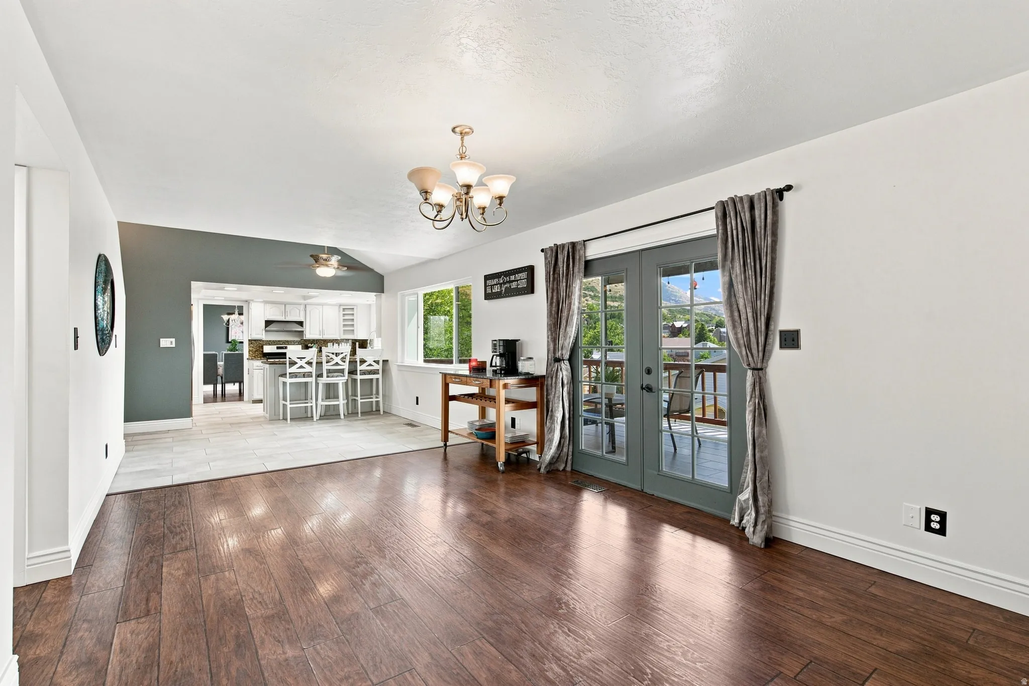 Living room facing semi formal dining and kitchen