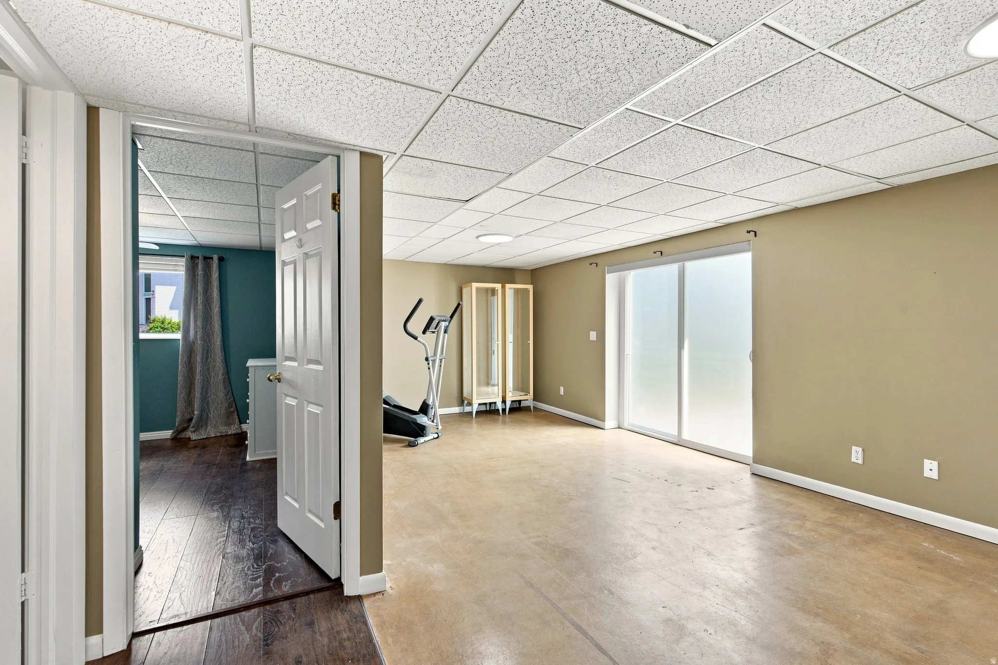 Hallway to basement bedroom