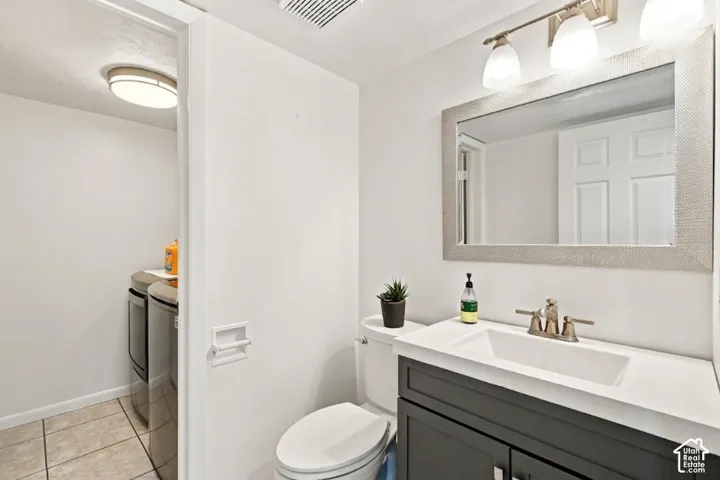 Laundry area off of half bath