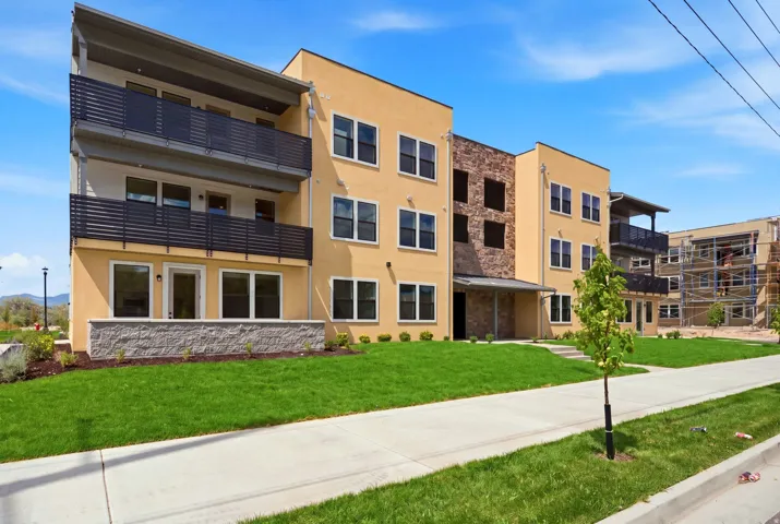Modern stucco exterior with stone accents