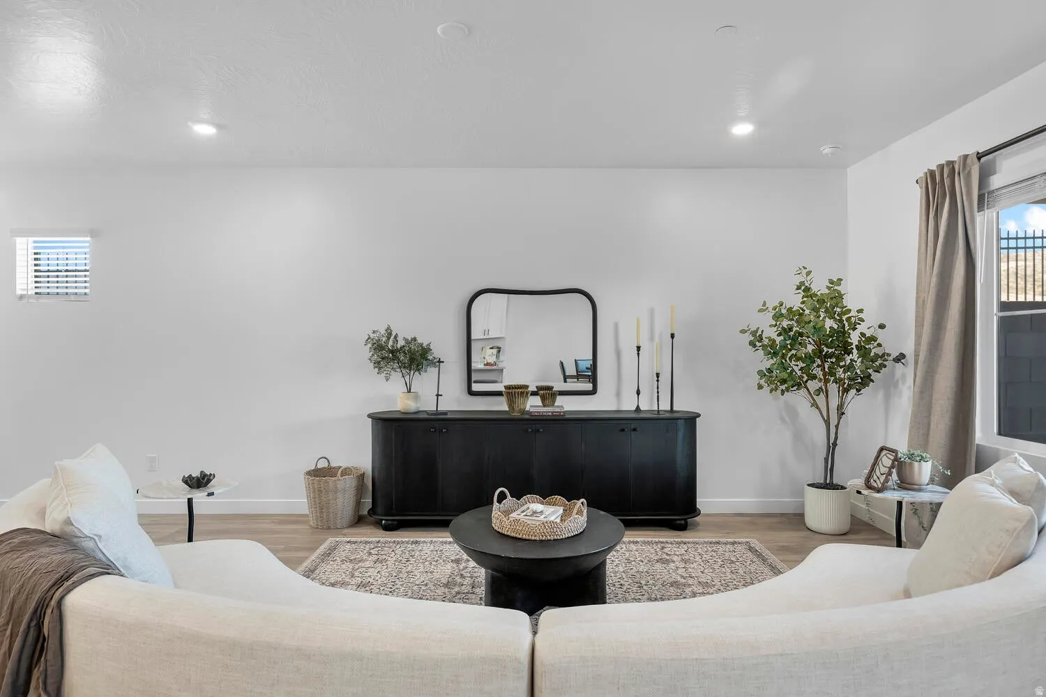 Recessed lighting and wood-finish flooring