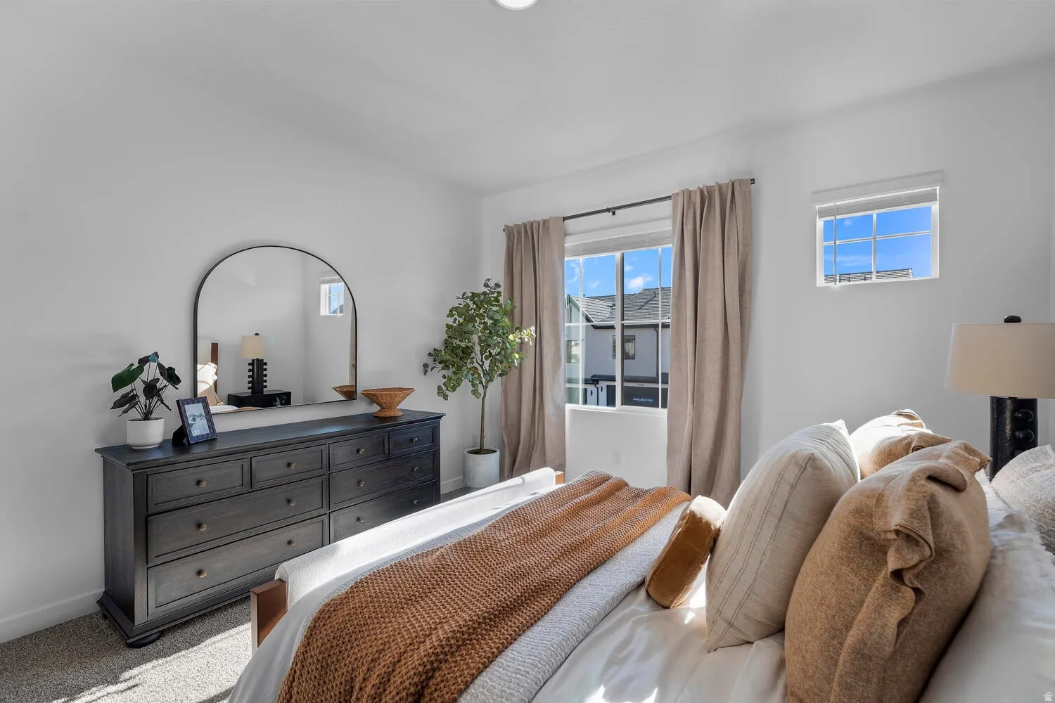 White walls, window with window treatments, recessed ceiling lighting, and carpet flooring