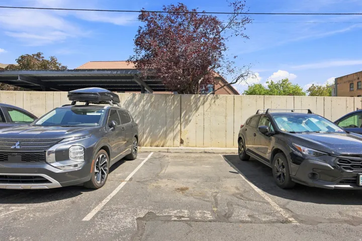 Paved parking area featuring designated spaces