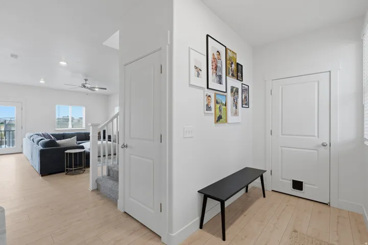 Light wood-finish flooring throughout the main level