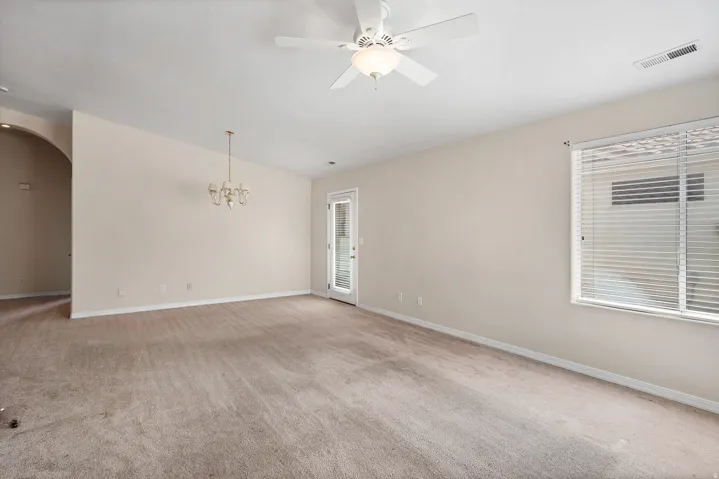 Neutral-toned carpeting throughout