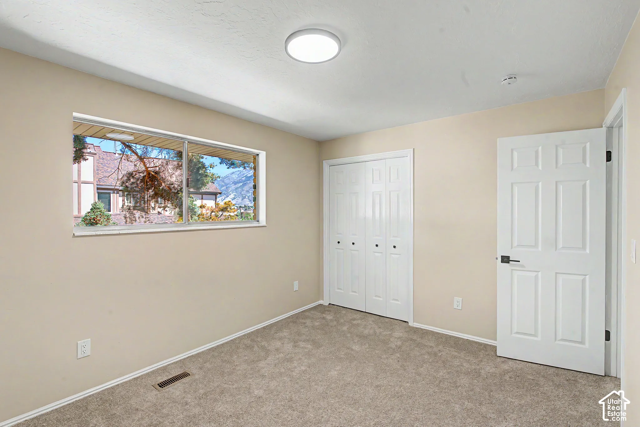 Bedroom 2 window view looking to Big Cottonwood Canyon and Brighton HS